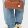 Amazona 31 Cropped-Tasche aus glänzendem Kalbsleder Amazona 31 Cropped-Tasche aus glänzendem Kalbsleder