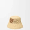 Anagram-Bucket-Hut aus Raffia und Kalbsleder Anagram-Bucket-Hut aus Raffia und Kalbsleder