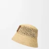 Anagram-Bucket-Hut aus Raffia und Kalbsleder Anagram-Bucket-Hut aus Raffia und Kalbsleder