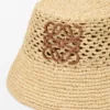 Anagram-Bucket-Hut aus Raffia und Kalbsleder Anagram-Bucket-Hut aus Raffia und Kalbsleder