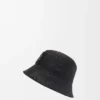 Bucket-Hut aus Raffia und Kalbsleder Bucket-Hut aus Raffia und Kalbsleder