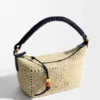 Cala Mini-Tasche aus klassischem Kalbsleder und Raffia Cala Mini-Tasche aus klassischem Kalbsleder und Raffia
