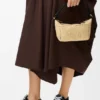 Cala Mini-Tasche aus klassischem Kalbsleder und Raffia Cala Mini-Tasche aus klassischem Kalbsleder und Raffia