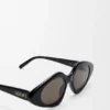 Dreieckige, schmale Sonnenbrille Dreieckige, schmale Sonnenbrille