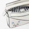 Futurist Cat Mini Puzzle-Tasche aus klassischem Kalbsleder Futurist Cat Mini Puzzle-Tasche aus klassischem Kalbsleder