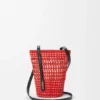 Geflochtene Tasche aus Iraca-Palmenblättern und Kalbsleder Geflochtene Tasche aus Iraca-Palmenblättern und Kalbsleder
