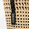 Geflochtene Tasche aus Iraca-Palmenblättern und Kalbsleder Geflochtene Tasche aus Iraca-Palmenblättern und Kalbsleder