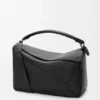 Grosse Puzzle-Tasche aus geschmeidigem genarbtem Kalbsleder Grosse Puzzle-Tasche aus geschmeidigem genarbtem Kalbsleder