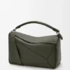 Grosse Puzzle-Tasche aus geschmeidigem genarbtem Kalbsleder Grosse Puzzle-Tasche aus geschmeidigem genarbtem Kalbsleder