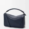 Grosse Puzzle-Tasche aus geschmeidigem genarbtem Kalbsleder Grosse Puzzle-Tasche aus geschmeidigem genarbtem Kalbsleder