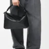 Grosse Puzzle-Tasche aus geschmeidigem genarbtem Kalbsleder Grosse Puzzle-Tasche aus geschmeidigem genarbtem Kalbsleder