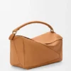 Grosse Puzzle-Tasche aus geschmeidigem genarbtem Kalbsleder Grosse Puzzle-Tasche aus geschmeidigem genarbtem Kalbsleder