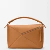 Grosse Puzzle-Tasche aus geschmeidigem genarbtem Kalbsleder Grosse Puzzle-Tasche aus geschmeidigem genarbtem Kalbsleder