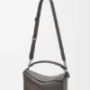 Grosse Puzzle-Tasche aus geschmeidigem genarbtem Kalbsleder Grosse Puzzle-Tasche aus geschmeidigem genarbtem Kalbsleder