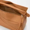 Grosse Puzzle-Tasche aus geschmeidigem genarbtem Kalbsleder Grosse Puzzle-Tasche aus geschmeidigem genarbtem Kalbsleder