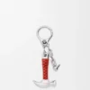 Hammer-Anhänger aus Messing und Kalbsleder Hammer-Anhänger aus Messing und Kalbsleder