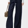 Jeans mit Gürtel aus Denim Jeans mit Gürtel aus Denim