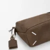 Kleine «Featherlight Puzzle»-Tasche aus genarbtem Nubukleder Kleine «Featherlight Puzzle»-Tasche aus genarbtem Nubukleder