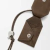 Kleine «Featherlight Puzzle»-Tasche aus genarbtem Nubukleder Kleine «Featherlight Puzzle»-Tasche aus genarbtem Nubukleder