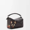 Kleine «Futurist Cat»-Puzzle-Tasche aus klassischem Kalbsleder Kleine «Futurist Cat»-Puzzle-Tasche aus klassischem Kalbsleder