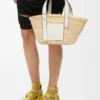 Kleine Korb-Tasche aus Palmblättern und Kalbsleder Kleine Korb-Tasche aus Palmblättern und Kalbsleder