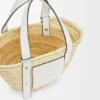 Kleine Korb-Tasche aus Palmblättern und Kalbsleder Kleine Korb-Tasche aus Palmblättern und Kalbsleder