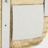 Kleine Korb-Tasche aus Palmblättern und Kalbsleder Kleine Korb-Tasche aus Palmblättern und Kalbsleder