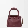 Kleine Madrid-Tasche aus geschmeidigem Kalbsleder Kleine Madrid-Tasche aus geschmeidigem Kalbsleder