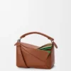 Kleine, mehrschichtige Puzzle-Tasche aus klassischem Kalbsleder Kleine, mehrschichtige Puzzle-Tasche aus klassischem Kalbsleder