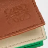 Kleine, mehrschichtige Puzzle-Tasche aus klassischem Kalbsleder Kleine, mehrschichtige Puzzle-Tasche aus klassischem Kalbsleder