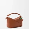 Kleine, mehrschichtige Puzzle-Tasche aus klassischem Kalbsleder Kleine, mehrschichtige Puzzle-Tasche aus klassischem Kalbsleder