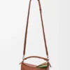 Kleine, mehrschichtige Puzzle-Tasche aus klassischem Kalbsleder Kleine, mehrschichtige Puzzle-Tasche aus klassischem Kalbsleder