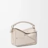 Kleine Panta Puzzle-Tasche aus glänzendem Kalbsleder Kleine Panta Puzzle-Tasche aus glänzendem Kalbsleder