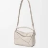 Kleine Panta Puzzle-Tasche aus glänzendem Kalbsleder Kleine Panta Puzzle-Tasche aus glänzendem Kalbsleder
