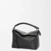 Kleine Puzzle Edge-Tasche aus klassischem Kalbsleder Kleine Puzzle Edge-Tasche aus klassischem Kalbsleder