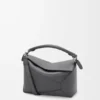 Kleine Puzzle Edge-Tasche aus klassischem Kalbsleder Kleine Puzzle Edge-Tasche aus klassischem Kalbsleder