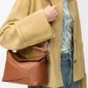 Kleine Puzzle Edge-Tasche aus klassischem Kalbsleder Kleine Puzzle Edge-Tasche aus klassischem Kalbsleder