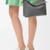 Kleine Puzzle Edge-Tasche aus klassischem Kalbsleder Kleine Puzzle Edge-Tasche aus klassischem Kalbsleder