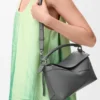 Kleine Puzzle Edge-Tasche aus klassischem Kalbsleder Kleine Puzzle Edge-Tasche aus klassischem Kalbsleder