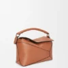 Kleine Puzzle Edge-Tasche aus klassischem Kalbsleder Kleine Puzzle Edge-Tasche aus klassischem Kalbsleder
