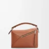 Kleine Puzzle Edge-Tasche aus klassischem Kalbsleder Kleine Puzzle Edge-Tasche aus klassischem Kalbsleder