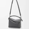 Kleine Puzzle Edge-Tasche aus klassischem Kalbsleder Kleine Puzzle Edge-Tasche aus klassischem Kalbsleder