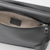 Kleine Puzzle Edge-Tasche aus klassischem Kalbsleder Kleine Puzzle Edge-Tasche aus klassischem Kalbsleder