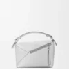 Kleine Puzzle Edge-Tasche aus laminiertem Lammleder Kleine Puzzle Edge-Tasche aus laminiertem Lammleder