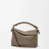Kleine Puzzle Edge-Tasche aus weichem, genarbtem Kalbsleder Kleine Puzzle Edge-Tasche aus weichem, genarbtem Kalbsleder