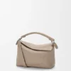 Kleine Puzzle Edge-Tasche aus weichem, genarbtem Kalbsleder Kleine Puzzle Edge-Tasche aus weichem, genarbtem Kalbsleder