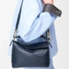 Kleine Puzzle Edge-Tasche aus weichem, genarbtem Kalbsleder Kleine Puzzle Edge-Tasche aus weichem, genarbtem Kalbsleder