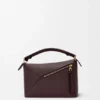Kleine Puzzle Edge-Tasche aus weichem, genarbtem Kalbsleder Kleine Puzzle Edge-Tasche aus weichem, genarbtem Kalbsleder