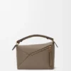 Kleine Puzzle Edge-Tasche aus weichem, genarbtem Kalbsleder Kleine Puzzle Edge-Tasche aus weichem, genarbtem Kalbsleder