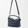 Kleine Puzzle Edge-Tasche aus weichem, genarbtem Kalbsleder Kleine Puzzle Edge-Tasche aus weichem, genarbtem Kalbsleder